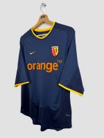 Maillot vintage RC Lens away Nike 2001-2002 vue complète, col et manches jaune or, sponsor Orange