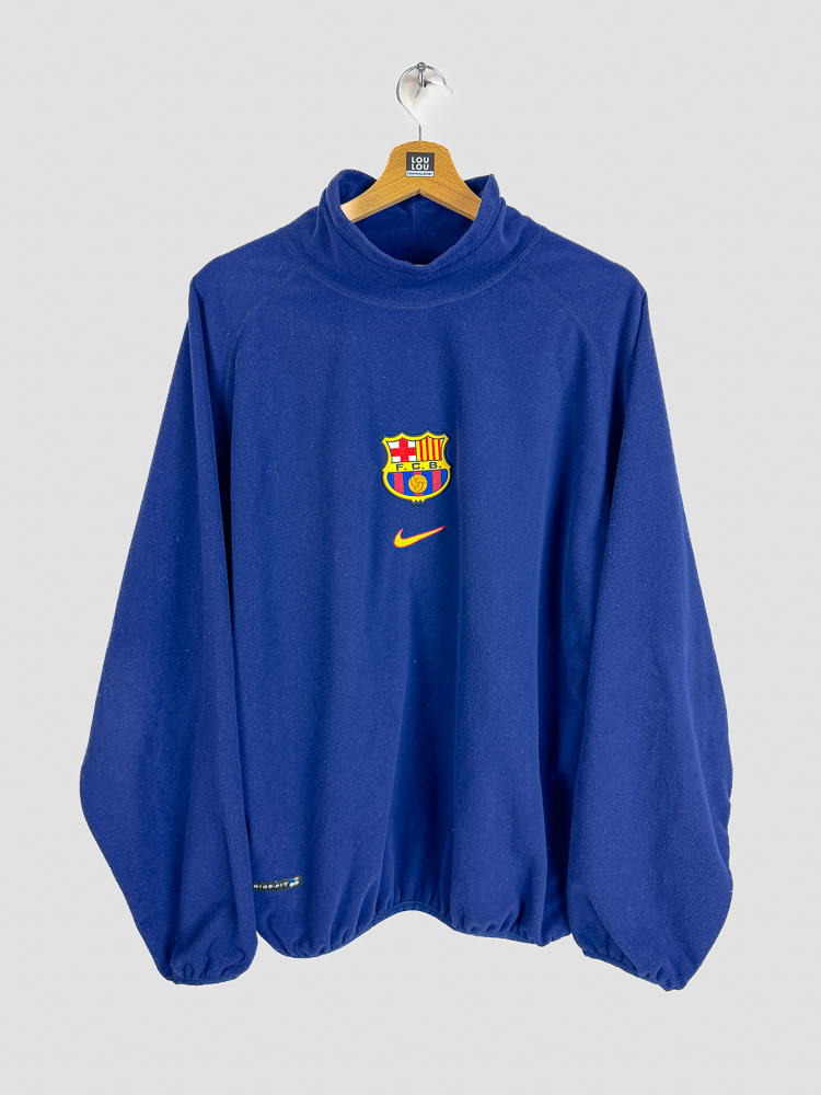 fleece-retro-fc-barcelone-98-99-bleu-officiel-nike-football-vintage Fleece rétro officiel FC Barcelone 1998-99 Nike bleu football vintage col montant présenté sur cintre