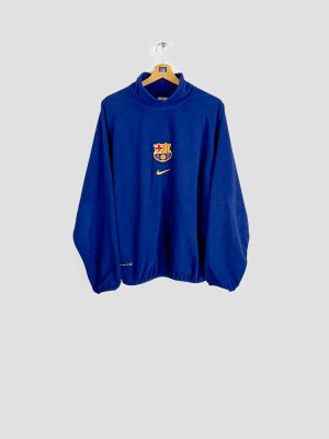 polaire-vintage-fc-barcelone-1998-1999-nike-vue-de-face-sur-cintre Polaire vintage FC Barcelone 1998-1999 Nike bleu col montant avec écusson FCB brodé vue de face sur cintre